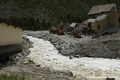Crue du torrent des �tan�ons � la B�rarde - d�g�ts autour de l'�glise et du nouveau lit du torrent